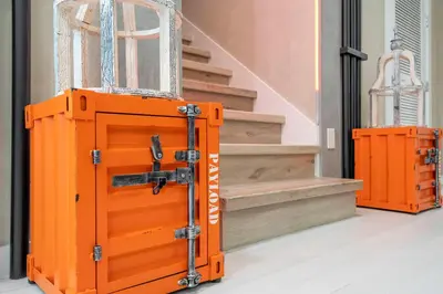 an orange box sitting next to a set of stairs at A Galaxy’s Edge Experience Awaits 5 Min to Disney in Orlando