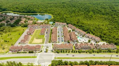 an aerial view of a resort with a parking lot at A Galaxy’s Edge Experience Awaits 5 Min to Disney in Orlando