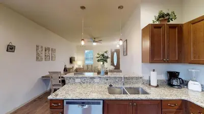 a kitchen with a sink and a counter top at Quiet 2 Bed Cottage in Oviedo w Resort Discounts in Oviedo