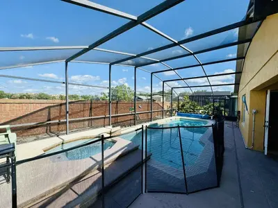 a swimming pool on top of a building at 43 Vacation Home With Private Pool Located At Formosa Gardens!! in Orlando