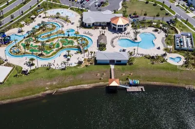 an aerial view of a resort with two pools at Storey Lake *10 mim -> Disney* 4Q/3Ba in Kissimmee