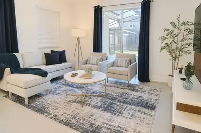 a living room with two couches and a table at 4Q/3B * Nova e Luxuosa c/Piscina Priv * in Kissimmee