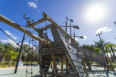 a slide at a park with the sky at 4Q/3B * Nova e Luxuosa c/Piscina Priv * in Kissimmee