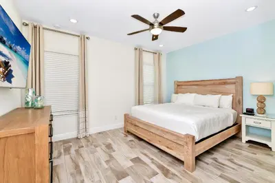 a bedroom with a bed and a ceiling fan at Calming Villa Near Disney With Margaritaville Resort And Island H20 Waterpark Access - 2914Cl in Orlando
