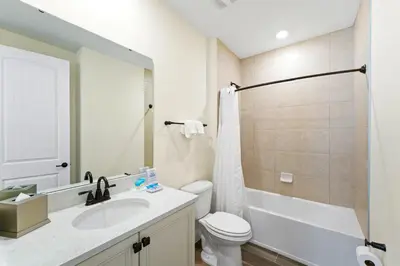 a bathroom with a sink and a toilet and a shower at Orange Bliss Villa Near Disney With Margaritaville Resort & Island H20 Waterpark Access - 2955Cl in Kissimmee