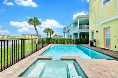 a swimming pool in the backyard of a house at Sunshine Cottage With Private Pool Near Disney With Margaritaville Resort & Island H20 Access - 8165Su in Orlando