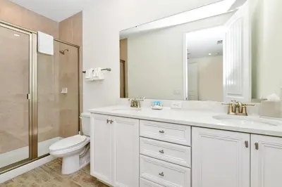 a bathroom with a toilet and a sink and a shower at Paradise Villa Near Disney With Margaritaville Resort & Island H20 Access - 8186Cp in Kissimmee