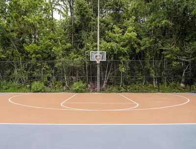 a basketball court with a net on top of it at Relax & Enjoy 1BR Home Near Disney Parks With Lake view in Kissimmee