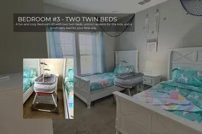 a bedroom with two twin beds and a sink at Spacious 4-Bedroom Family Retreat Near Disneyland! in Kissimmee