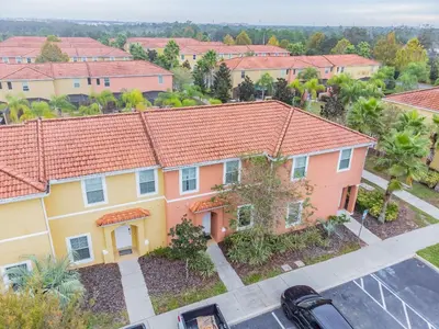 an overhead view of a house with orange roof at Casa 3Q Resort + Jacuzzi Perto Disney in Kissimmee
