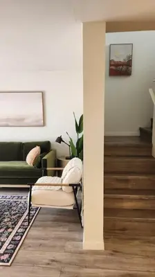 a living room with a couch and a chair at Fantasy Villas resort - Waterpark Included - Family Paradise! minutes to Disney in Kissimmee