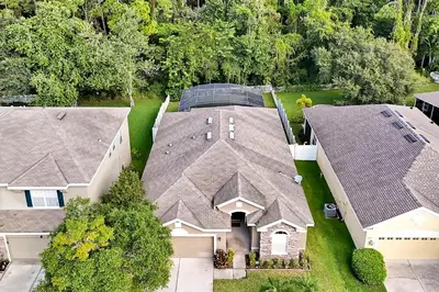 an overhead view of a house with a roof at Entire home w/ Private Pool,Gated Near Disney in Orlando