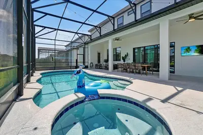 a swimming pool in a house with a house at Gorgeous Paradiso Mansion-Poolgame Roomtheater-3 in Orlando