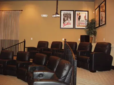 a waiting room with leather chairs and a waiting room at Four Bedroom Villa in Coral Cay in Kissimmee