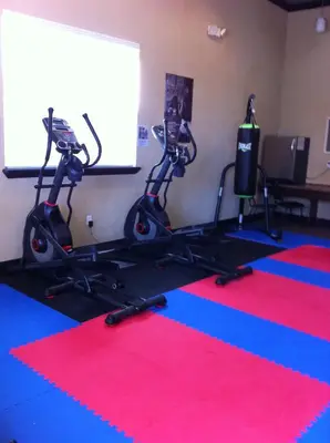 a gym with two exercise bikes in a room at Four Bedroom Villa in Coral Cay in Kissimmee