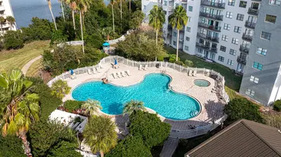 an overhead view of a swimming pool in a resort at 6165 Carrier Drive 1001 in Orlando