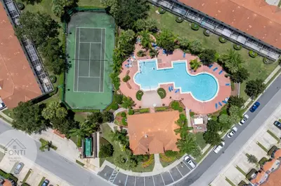 an overhead view of a park with a pool at 4875 Resort Townhouse by Disney World Orlando in Kissimmee