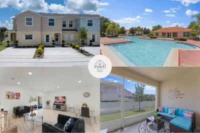 a home with a swimming pool and a house at 4875 Resort Townhouse by Disney World Orlando in Kissimmee