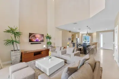 a living room with a couch and a table at Luxury 4BR Townhouse Next to Disney Orlando 3201 in Orlando