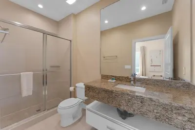 a bathroom with a toilet and a sink and a shower at Luxury 4BR Townhouse Next to Disney Orlando 3173 in Orlando