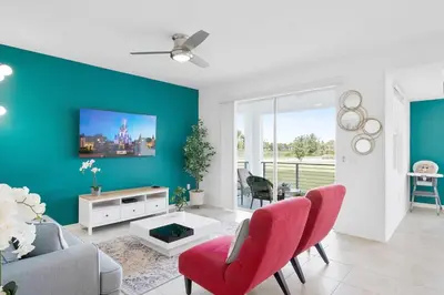 a living room with a couch and a table at Modern Storey Lake Resort Disney Orlando 3191-103 in Kissimmee