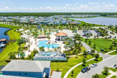 an aerial view of a resort with a pool at Modern Storey Lake Resort Disney Orlando 4751-306 in Kissimmee