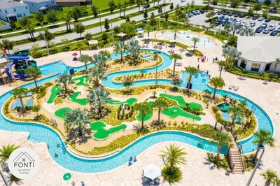 an aerial view of a water park at a resort at Modern Storey Lake Resort Disney Orlando 3161-405 in Kissimmee
