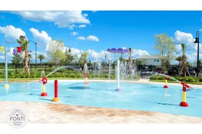 a swimming pool with a water park at Brand New Lakeview Storey Lake Resort Disney 3121-103 in Kissimmee