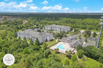 an aerial view of the apartment buildings at the resort at Secret Lake Resort 2BR Condo Apt Disney 3176-301 in Kissimmee