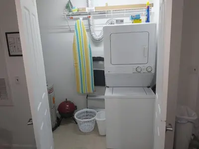 a kitchen with a microwave oven in a room at Smart home near Disney world, Silver Spurs Arena in Kissimmee