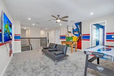 a living room with a couch and a table at AVH-2746-SL in Kissimmee
