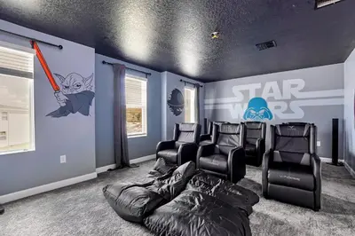 a room with a star wars room with black chairs at AVH-2746-SL in Kissimmee