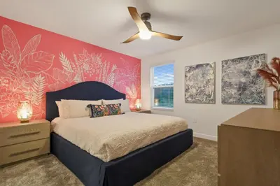a bedroom with a bed and a ceiling fan at Welcome to the Ultimate Vacation Wonderland in Kissimmee
