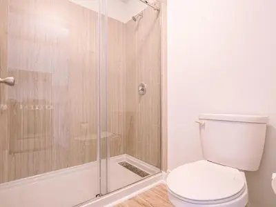 a bathroom with a toilet and a shower at Chilling 1BR Home in Orlando Next to Disney in Vineland