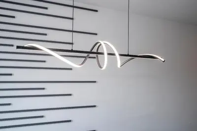 a chandelier hanging from a wall with lines at 8761 ZD - Elegant 3BR Villa in The Hub Resort - Comfort, Style, and Luxury for Your Perfect Getaway in Kissimmee