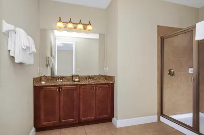 a bathroom with a sink and a shower at Charming Home Near Disney With Private Pool, Game Room And Waterpark & Resort Access At Encore Resorts Reunion - 410No in Kissimmee