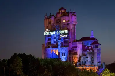 a building with a sign on it at night at Disney's All-Star Music Resort in Orlando