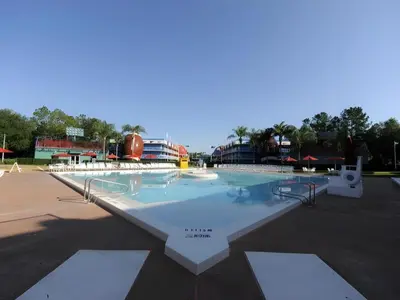 a large swimming pool in a parking lot at Disney's All-Star Sports Resort in Orlando