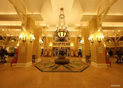 a large lobby with a chandelier and a fountain at Disney's Beach Club Resort in Orlando