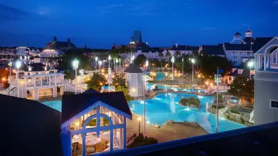 a view of a city at night with a swimming pool at Disney's Beach Club Resort in Orlando