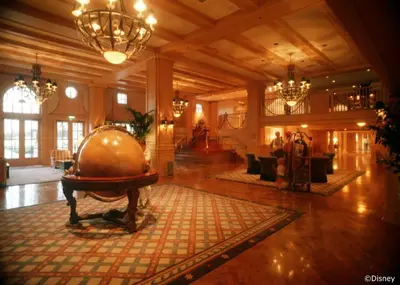 a large lobby with a large ball on the floor at Disney's Yacht Club Resort in Orlando