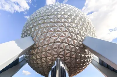 a view of a large metal ball against a blue sky at Disney's Boardwalk Inn in Orlando
