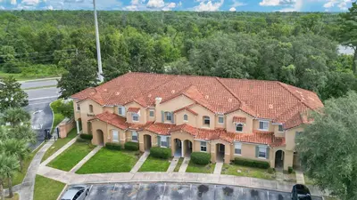 an aerial view of a house with a roof at Quiet Corner Gem in Gated Crestwynd Bay in Orlando