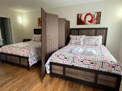 a bedroom with two twin beds at 15 - Amazing Vulcano Bay - Universal View in Orlando