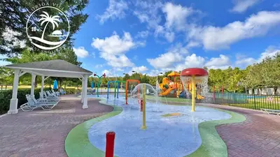 a playground with a water park with a water slide at Standard four beds Villas Seven Dwrafs - Close to Disney in Kissimmee