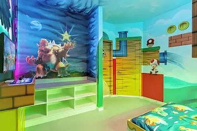a bedroom with a mario party mural at Casa 6Q Luxo c/ Piscina, Game Room e Cinema in Orlando