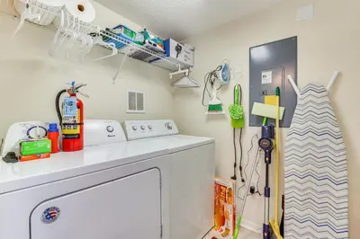 a childs playroom with a washing machine in a room at Townhome 7 Mi to Disney Parks Resort Pool Access! in Kissimmee