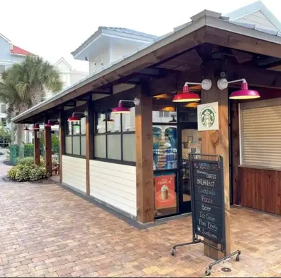 a food stand with a sign in front of it at Paradise island near Disney in Kissimmee