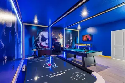 a room with a ping pong table in it at 2912 Storey Lake new game room 24 guests poolspa in Kissimmee