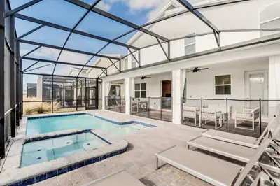 a swimming pool in a house with a glass ceiling at Brand New House Private Lake View 3009 Protagonist home in Kissimmee